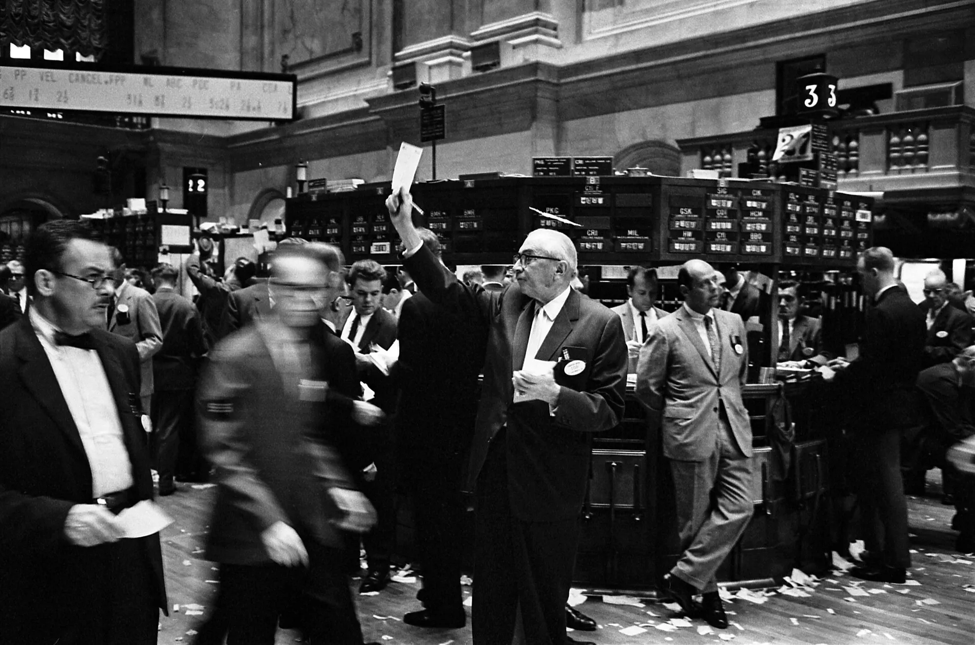 AI Bubble or AI Boom? A Balanced Look at the Market’s Biggest Debate Traders and financial data screens in a busy stock market setting